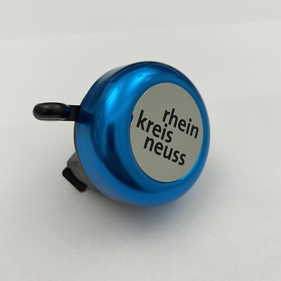 Eine Fahrradklingel mit dem Schriftzug "Rhein-Kreis Neuss"